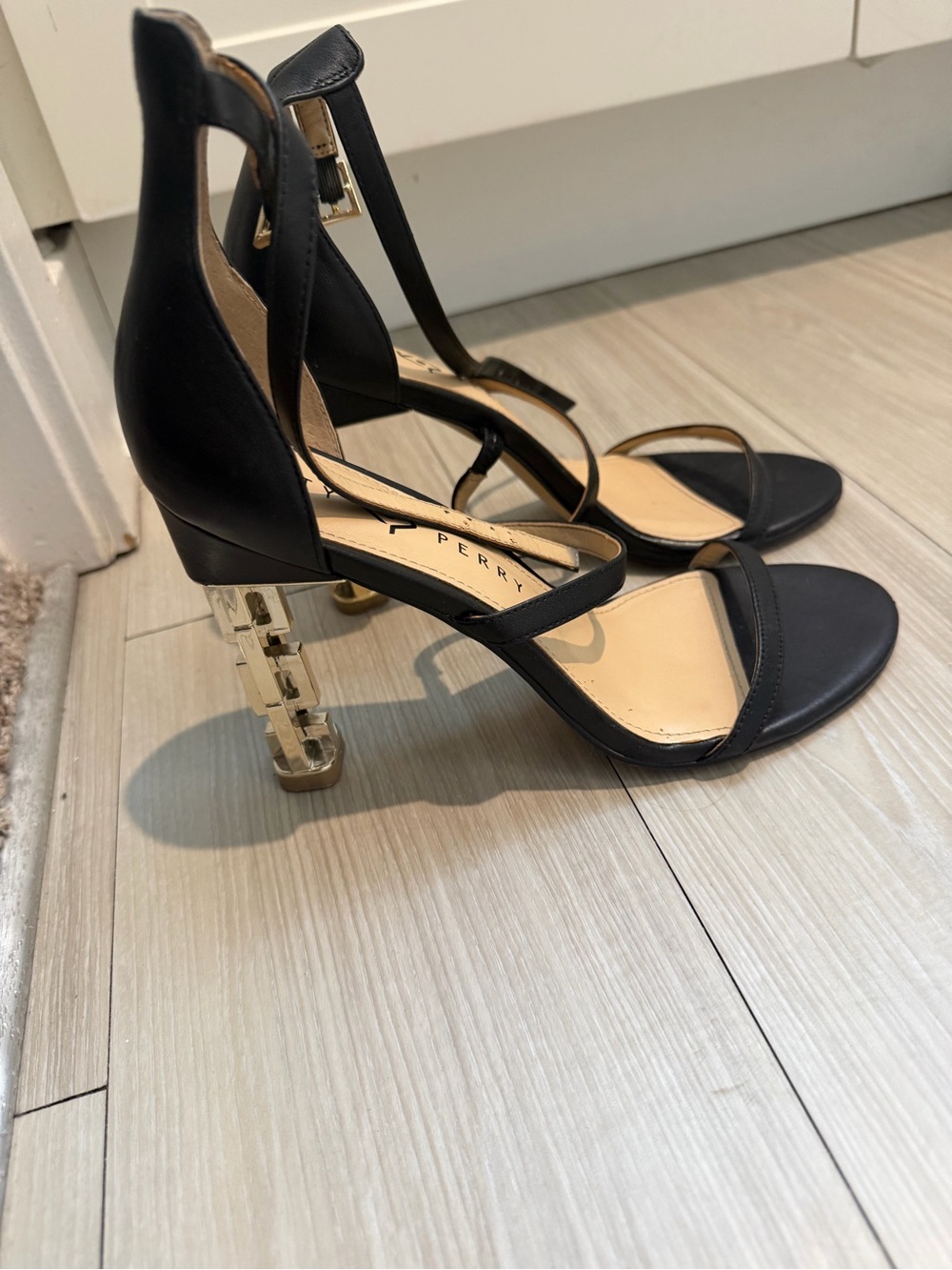 Katy Perry Collections Black Ankle-Strap Sandals with Gold Sculpted Heel